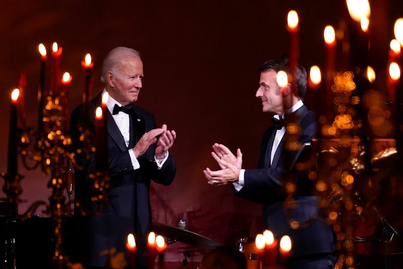 Mr Biden and Mr Macron have found common ground on the trip. AP