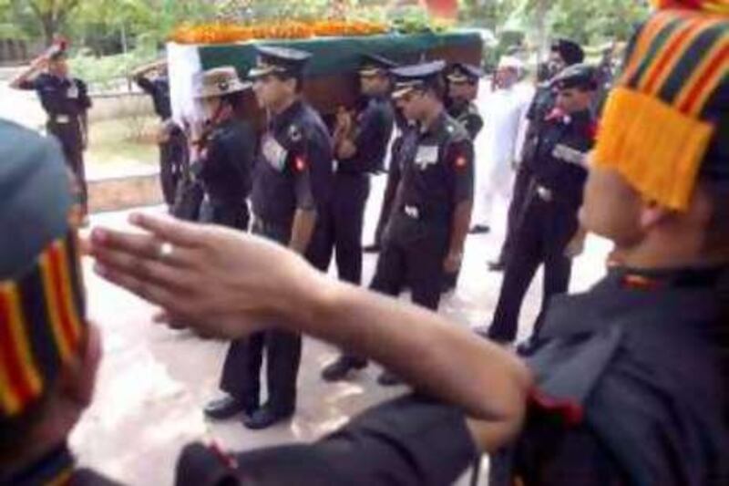 Indian Army officer R.D. Mehta's body arrives for cremation in New Delhi, India, Tuesday, July 8, 2008. (AP Photo/Mustafa Quraishi) *** Local Caption ***  XMQ106_India_Kabul_Attack.jpg *** Local Caption ***  XMQ106_India_Kabul_Attack.jpg