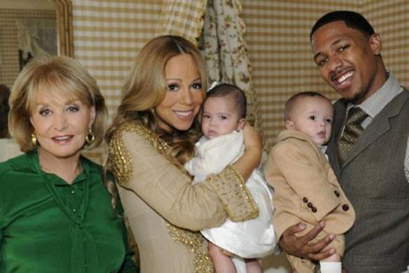 Barbara Walters with Mariah Carey, her husband Nick Gannon and their twin daughters.