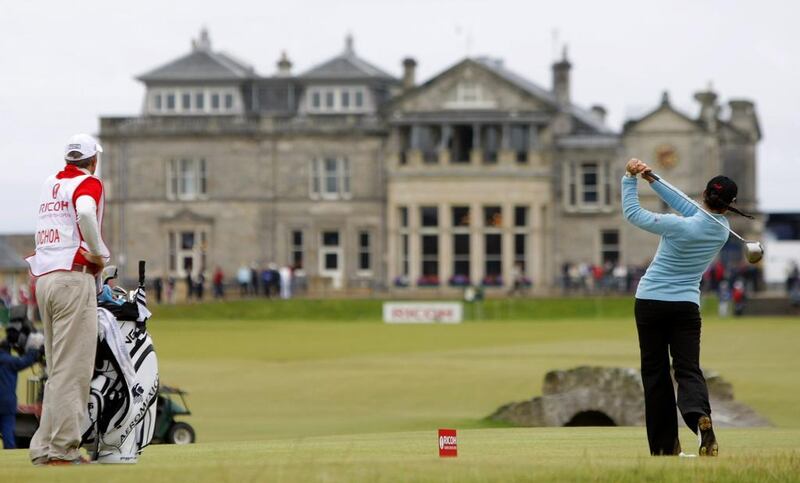 This is a  Sunday, Aug. 5, 2007 file photo of tournament winner and world number one Mexico's Lorena Ochoa as she tees off from the 18th with the St Andrews clubhouse in the background, during the Women's British Open golf tournament on the Old Course at the Royal and Ancient Golf Club in St Andrews, Scotland.  The Royal & Ancient could finally be allowing women to join one of the most influential golf clubs.  Matt Dunham / AP Photo