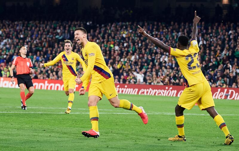 Clement Lenglet of Barcelona  celebrates after scoring his team's third goal against Real Betis on Sunday. Getty Images
