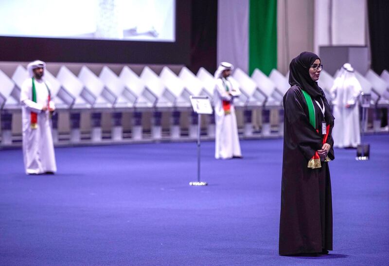 Abu Dhabi, United Arab Emirates, October 5, 2019.  
FNC Elections at ADNEC. -- FNC volunteer organizers stand ready to assist voters at the floor.
Victor Besa / The National
Section:  NA
Reporter:  Haneen Dajani