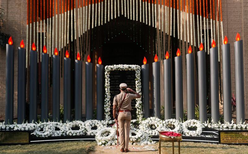 A police officer pays his respects at a memorial to mark the 12th anniversary of the November 26, 2008 attacks, in Mumbai, India. Reuters