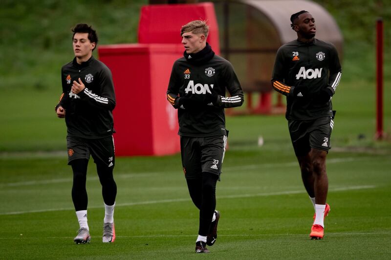 MANCHESTER, ENGLAND - NOVEMBER 16: (EXCLUSIVE COVERAGE) Facundo Pellistri, Brandon Williams, Aaron Wan-Bissaka of Manchester United in action during a first team training session at Aon Training Complex on November 16, 2020 in Manchester, England. (Photo by Ash Donelon/Manchester United via Getty Images)