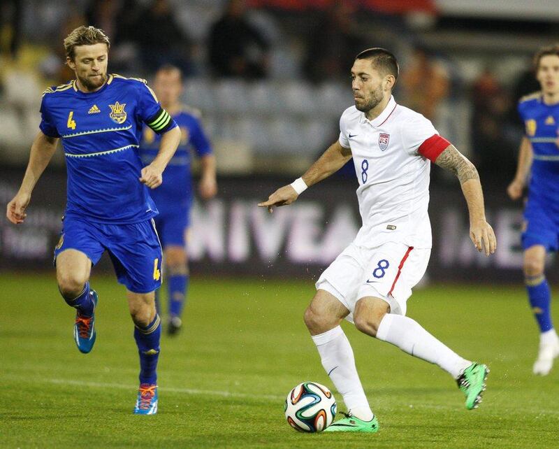 Clint Dempsey and USA lost to Ukraine 2-0. They'll play in Group G at the 2014 World Cup with Germany, Portugal and Ghana. Katia Christodoulou / EPA