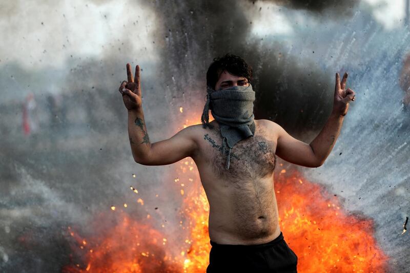 An Iraqi demonstrator gestures during ongoing anti-government protests in Baghdad. REUTERS