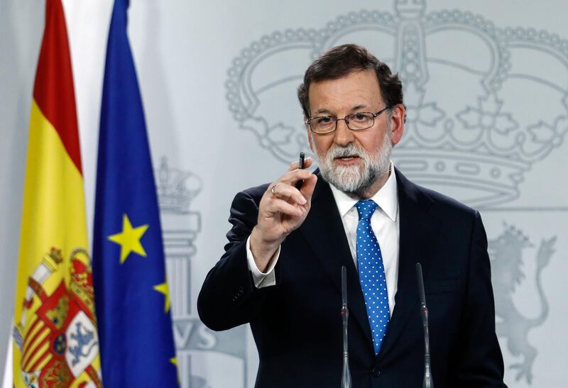 Spanish Prime Minister Mariano Rajoy gives a press conference one day after the Catalan regional elections, at La Moncloa Palace in Madrid, on December 22, 2017.  
Spanish Prime Minister Mariano Rajoy today rejected a call by ousted Catalan leader Carles Puigdemont to meet after separatists won a parliamentary majority in crucial regional polls.

 / AFP PHOTO / OSCAR DEL POZO