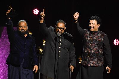 Shakti accepts the Global Music Album award for This Moment during the 66th Annual Grammy Awards. AFP