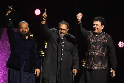 Shakti accepts the Global Music Album award for This Moment during the 66th Annual Grammy Awards. AFP