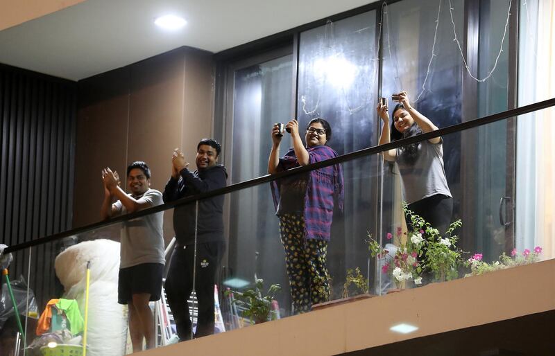 DUBAI, UNITED ARAB EMIRATES , March 25 – 2020 :- UAE residents cheering from their balconies and homes on Wednesday night at Al Mankhool area in Bur Dubai for doctors and medical staff for their tireless efforts in these critical times in Dubai. (Pawan Singh / The National) For News/Online/Standalone/Instagram