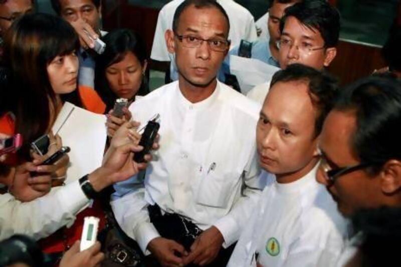 Mya Aye, a member of the 88 Generation Students Group, talks to journalists at Yangon airport in February, 2012.