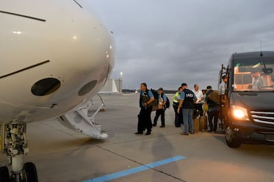 International Atomic Energy Agency team members board a plane at Vienna International Airport in Schwechat, Austria, for a journey to Ukraine to inspect the Zaporizhzhia nuclear plant. AFP