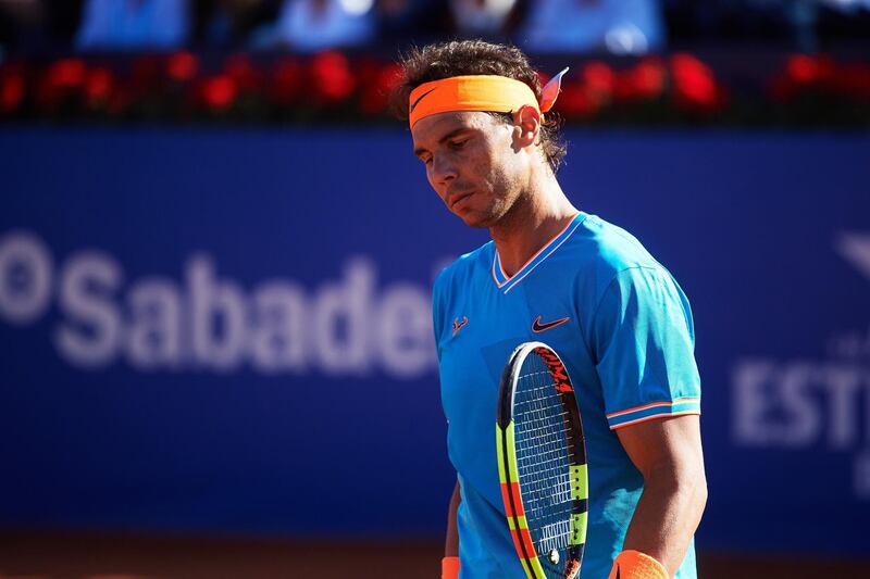 BARCELONA, SPAIN - APRIL 27: Rafael Nadal of Spain looks down during his semifinal match against Dominic Thiem of Austria during day six of the Barcelona Open Banc Sabadell at Real Club De Tenis Barcelona on April 27, 2019 in Barcelona, Spain. (Photo by Alex Caparros/Getty Images)