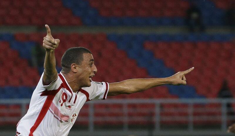Tunisia's Ahmed Akaichi celebrates after scoring in his side's 1-1 draw with DR Congo in the Africa Cup of Nations on Monday as they advanced to the quarter-finals. Themba Hadebe / AP / January 26, 2015 