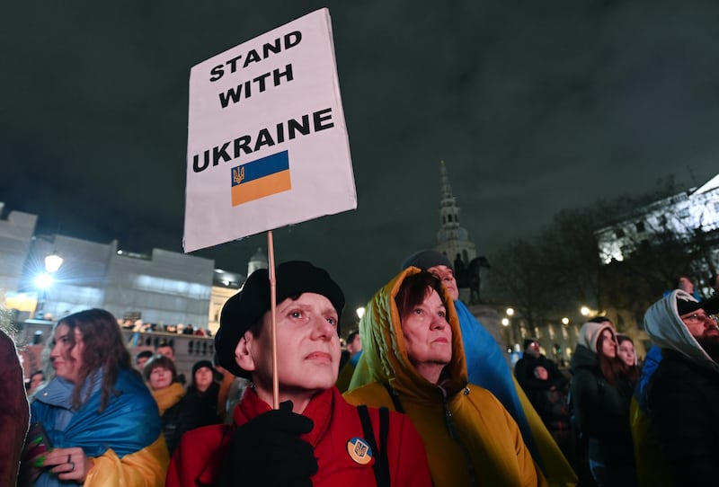 Ukrainians at Trafalgar Square. EPA