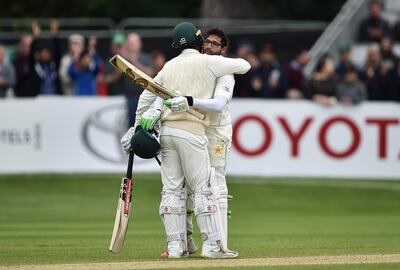 MALAHIDE, IRELAND - MAY 15: Imam ul-Haq of Pakistan is embraced by team mate Shadab Khan after scoring the winning run on the fifth day of the international test cricket match between Ireland and Pakistan on May 15, 2018 in Malahide, Ireland. (Photo by Charles McQuillan/Getty Images)