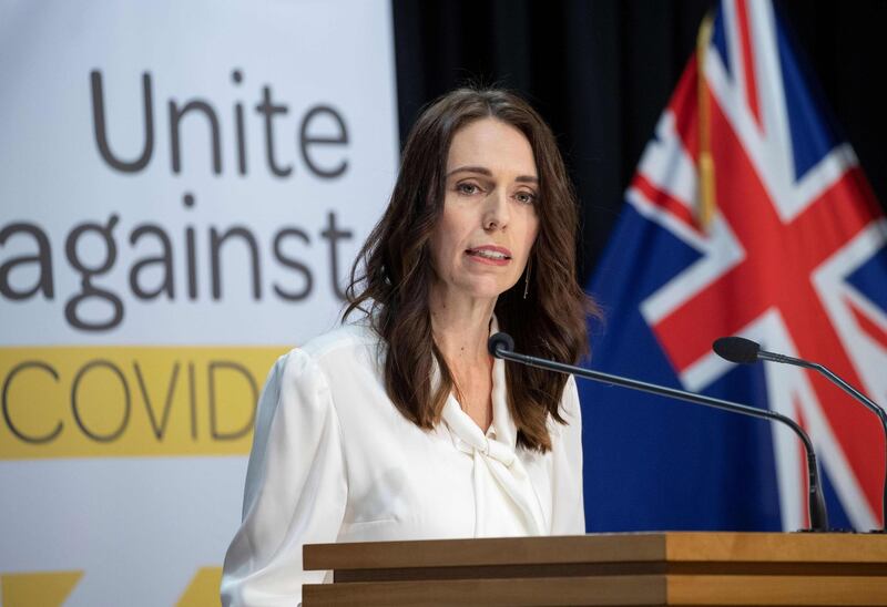(FILES) In this file photo taken on April 20, 2020 New Zealand Prime Minister Jacinda Ardern speaks at a post-Cabinet media conference at Parliament House in Wellington where she announced the Covid-19 coronavirus lockdown level 4 will continue for another week. In New Zealand, no one is exempt from strict coronavirus prevention measures -- not even Prime Minister Ardern, who was denied entry to a cafe because of her own social distancing rules. / AFP / POOL / Mark Mitchell
