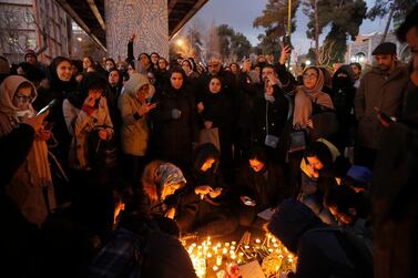 Iranians light candles for victims of Ukraine International Airlines Boeing 737-800 as they protest in front of the Amir Kabir University in Tehran, Iran. EPA