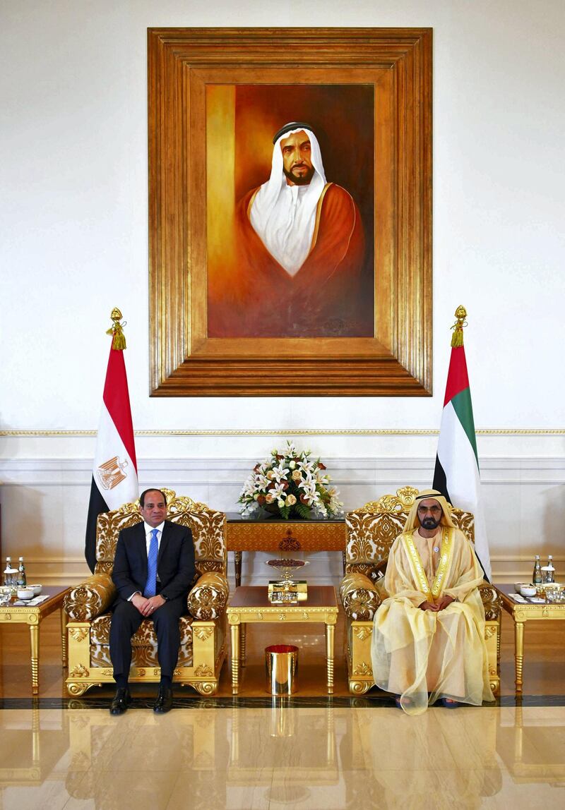 A handout picture released by the Egyptian Presidency on February 6, 2018 shows Egyptian President Abdel Fattah al-Sisi (L) being received by Sheikh Mohammed bin Rashid Al-Maktoum, Vice President and Prime Minister of the United Arab Emirates and ruler of Dubai, in the Emirati capital Abu Dhabi. (Photo by - / EGYPTIAN PRESIDENCY / AFP) / === RESTRICTED TO EDITORIAL USE - MANDATORY CREDIT "AFP PHOTO / HO / EGYPTIAN PRESIDENCY' - NO MARKETING NO ADVERTISING CAMPAIGNS - DISTRIBUTED AS A SERVICE TO CLIENTS ==