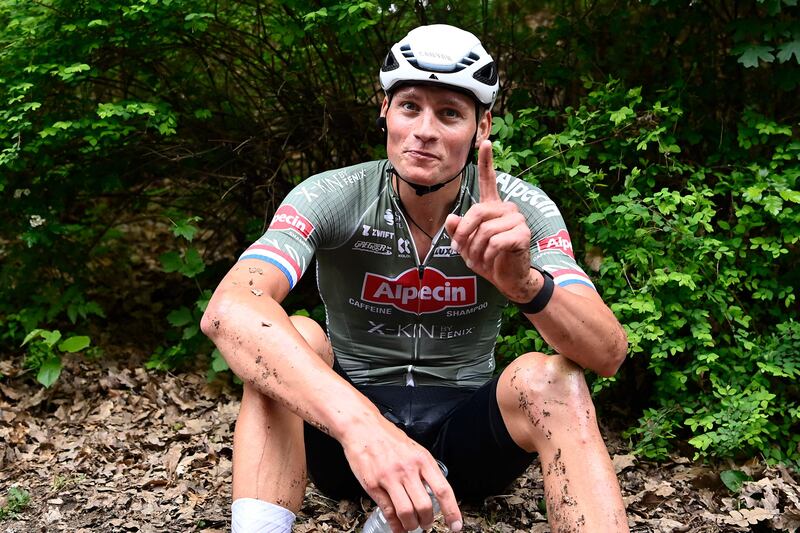 Mathieu van der Poel catches his breath after crossing the finish line to win the first stage of the Giro d'Italia. AFP