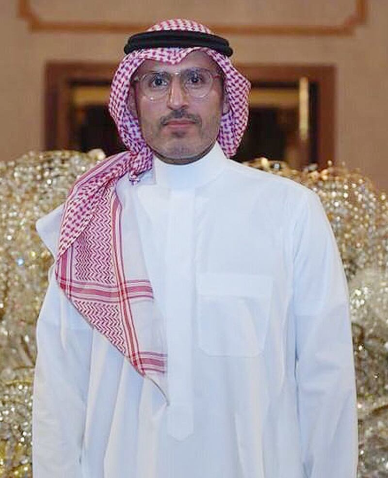 Prince Sultan Bin Fahad Bin Nasser Al-Saud in front of his work 'To Dust'. Athr Gallery