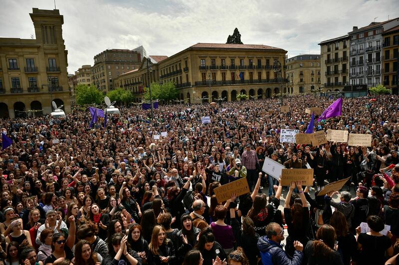 Thousands people crowd at Plaza del Castillo square during a protest in Pamplona, northern Spain, Saturday, April 28, 2018. Women's rights groups protest after a court in Pamplona sentenced five men to nine years each in prison for sexual abuse in what activists saw as a gang rape during the 2016 running of the bulls festival in Pamplona.(AP Photo/Alvaro Barrientos)