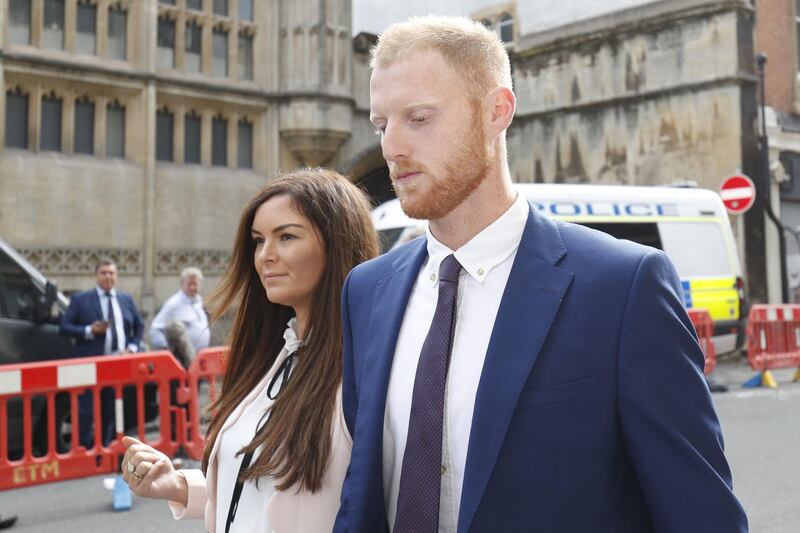 England cricketer Ben Stokes and his wife Clare arrive at Bristol Crown Court in Bristol, south-west England on August 14, 2018, during his trial on charges of affray. (Photo by Adrian DENNIS / AFP)