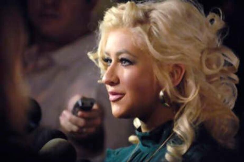 Host Christina Aguilera is interviewed at a Rock the Vote event Tuesday, Nov. 13, 2007 in West Hollywood, Calif. (AP Photo/Phil McCarten)
