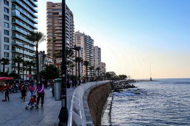 People spend a day at the corniche during a sunny day in Beirut. Lebanon’s private sector economy continued to contract in December on lower demand. EPA