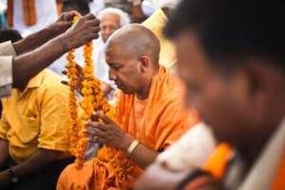 Bharatiya Janta Party's candidate, and minister of parliament, Yogi Adityanath is welcomed with garlands by the gathered audience in villages during his campaign in the outskirts of Gorakhpur, Uttar Pradesh, India. Photograph: Sanjit Das for The National