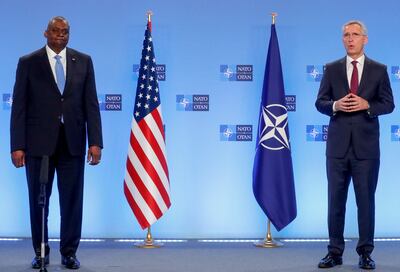 US Secretary for Defence Lloyd Austin, left, speaks during a joint press statement with Nato Secretary General Jens Stoltenberg prior to a meeting of Nato defense ministers at Nato headquarters in Brussels on Wednesday. AP Photo