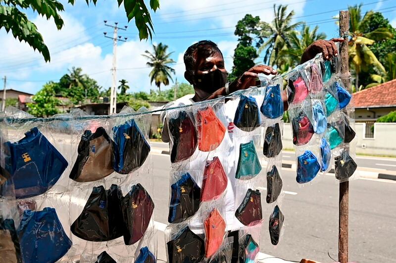 A street vendor sells facemasks in Piliyandala, a suburb of Sri Lanka's capital Colombo. AFP