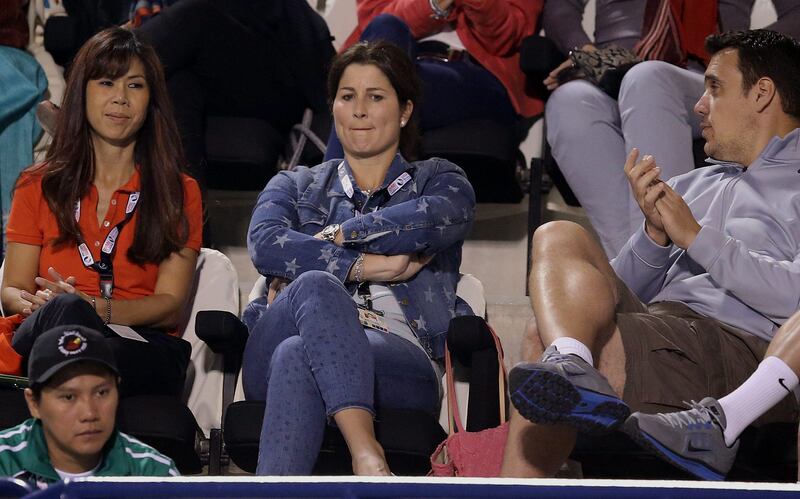 epa03603235 Mirka Federer (C) wife of Roger Federer of Switzerland watch his match against Spain's Marcel Granollers during the third round of the Dubai Duty Free Tennis ATP Championships in Dubai, United Arab Emirates, 27 February 2013.  EPA/ALI HAIDER *** Local Caption ***  03603235.jpg