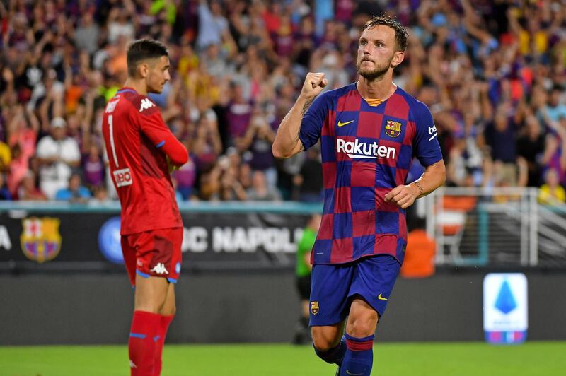 Barcelona's Ivan Rakitic celebrates his winning goal in the 2-1 win over Napoli in Miami. Reuters