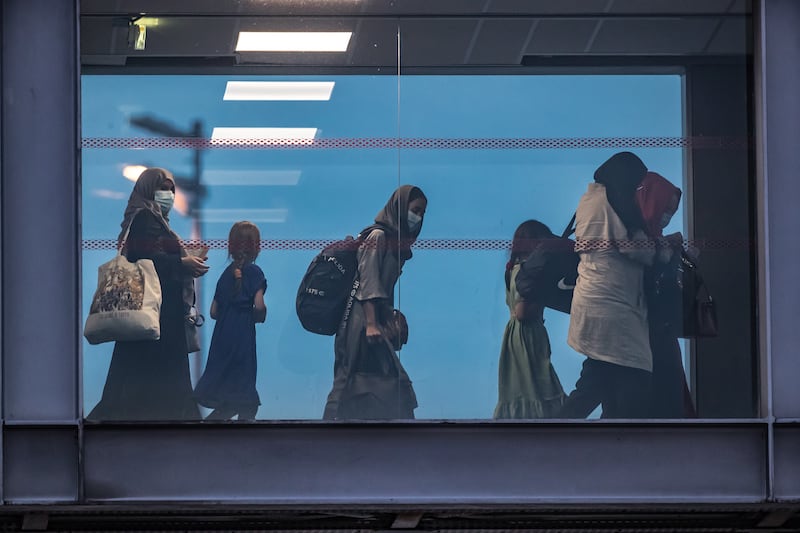 European and Afghan nationals disembark from a French military plane at Roissy Charles de Gaulle Airport from Kabul via Abu Dhabi on Wednesday. EPA