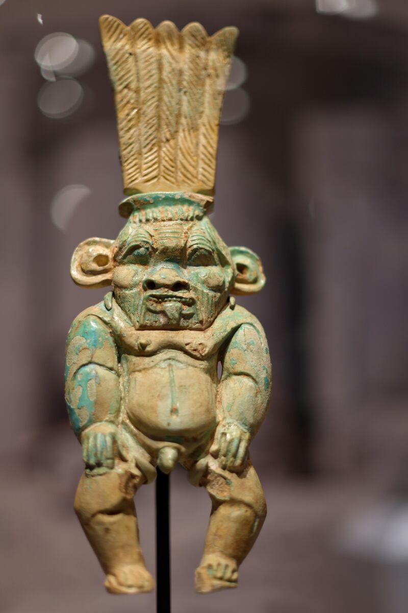 A statuette of the god Bes on display at the exhibition preview