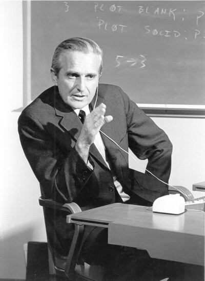 UNSPECIFIED  :  Douglas C. Engelbart, american engineer, inventor of the computer mouse in 1963, here at presentation of prototype on December 9, 1968  (Photo by Apic/Getty Images)