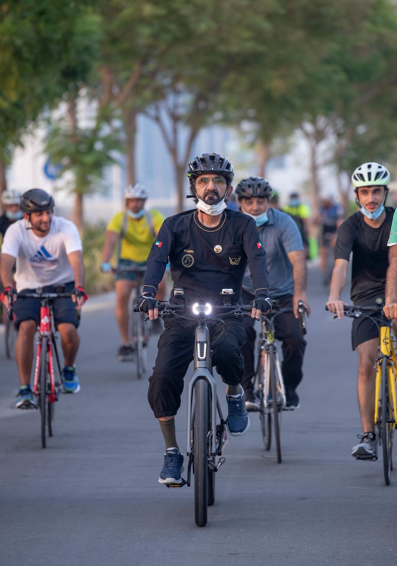 Sheikh Mohammed bin Rashid, Vice President and Ruler of Dubai, with friends and family as they cycle around Dubai on August 9. Courtesy: Dubai Media Office