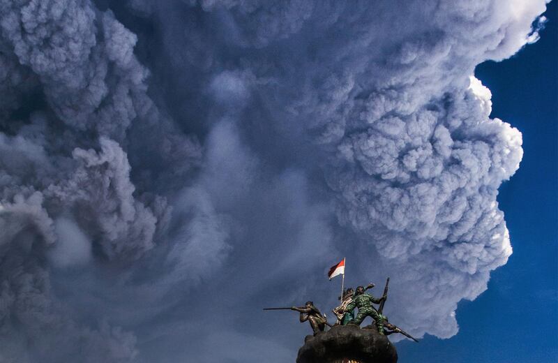 Ash spews about 5,000 metres into the air from Mount Sinabung volcano, seen from Brastagi town in Karo, North Sumatra, Indonesia. Antara Foto / Tibta Peranginangin/ via Reuters