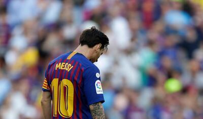 FC Barcelona's Lionel Messi looks down during the Spanish La Liga soccer match between FC Barcelona and Athletic Bilbao at the Camp Nou stadium in Barcelona, Spain, Saturday, Sept. 29, 2018. (AP Photo/Manu Fernandez)