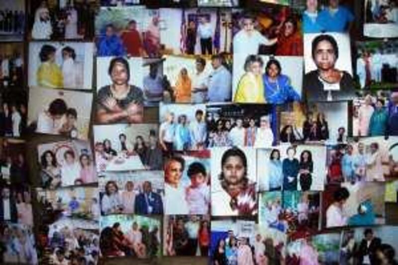 Pictures adorn the wall of domestic violence acid and burn attack patients at Pakistan's well-known Depilex Smileagain beauty salon chain, which cares for and rehabilitates the victims of acid and burn attacks, Lahore, Pakistan, By Matthew Tabaccos for The National. 01/06/09
 *** Local Caption ***  15.beautician cares for women attacked with acid Story, Lahore, Pakistan by Matthew Tabaccos.JPG