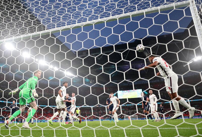 England defender Reece James heads the ball off the line. Reuters