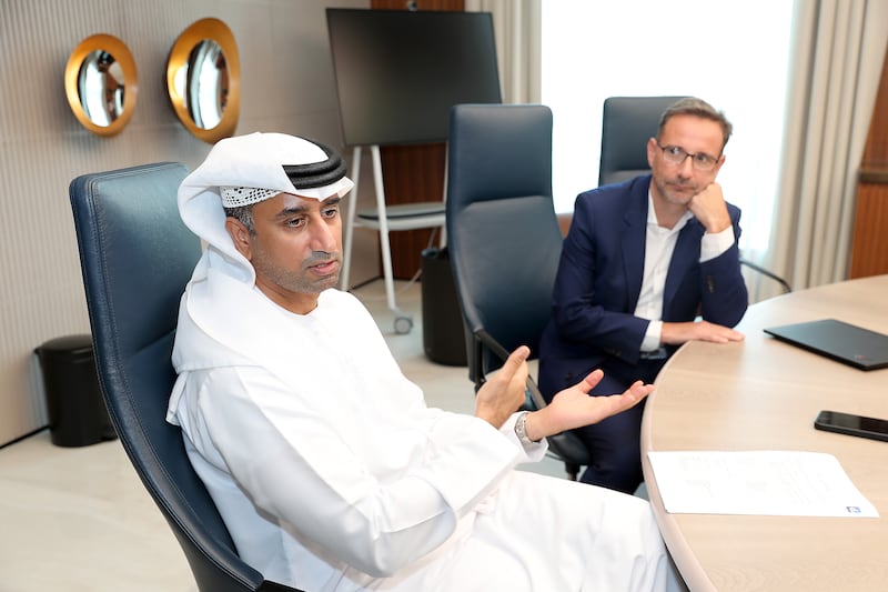 Fahad Al Hassawi, chief executive of du, and Nicolas Levi, chief executive of du Pay, during the launch of the new platform on Monday. Pawan Singh / The National