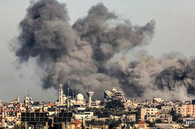Smoke from Israeli bombardments billows over Khan Younis from Rafah in the southern Gaza Strip on Saturday. AFP