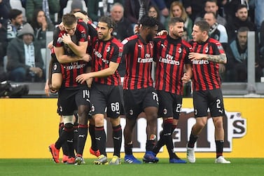 Soccer Football - Serie A - Juventus v AC Milan - Allianz Stadium, Turin, Italy - April 6, 2019 AC Milan's Krzysztof Piatek, Tiemoue Bakayoko, Ricardo Rodriguez and Franck Kessie celebrate scoring their first goal REUTERS/Massimo Pinca