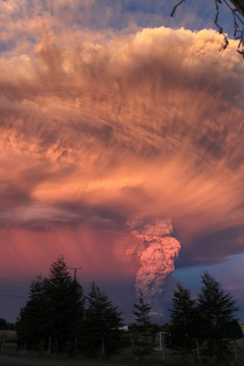 View from Puerto Montt, southern Chile, of a high column of ash and lava.   Diego Main / AFP Photo