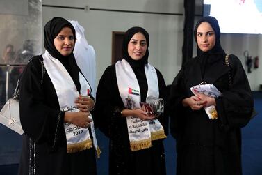 Jawaher Kardali, Asma Al Baloushi and Muna Kardali cast their vote at RAK Exhibition Centre. Pawan Singh / The National