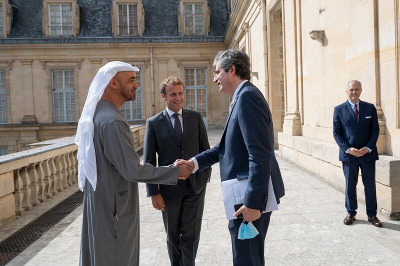Sheikh Mohamed is received by President Macron at the palace.