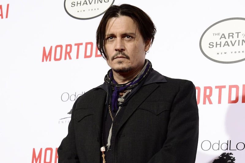 Johnny Depp was asked to step down from his role in the 'Fantastic Beasts' film franchise after the ruling in November. AP