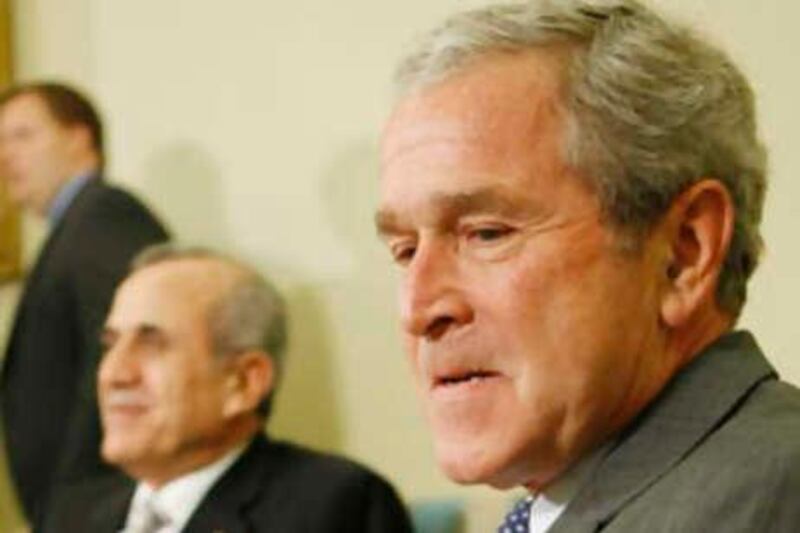 President Bush, right, with the President of Lebanon Michel Sleiman, left, during their meeting in the Oval Office of the White House, Thursday, Sept. 25, 2008 in Washington. (AP Photo/Pablo Martinez Monsivais) *** Local Caption ***  DCPM104_Bush_US_Lebanon.jpg